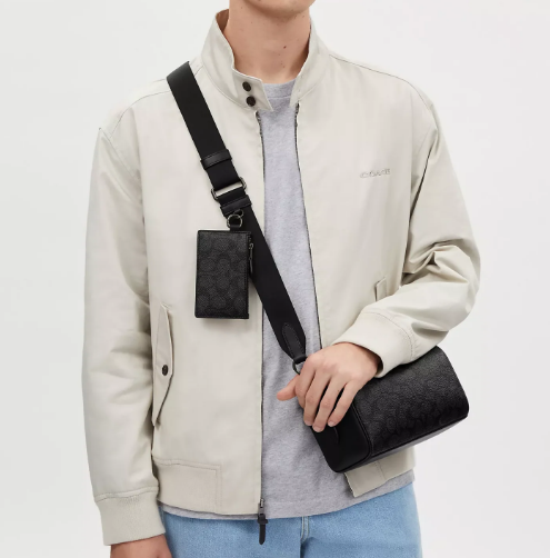 axel crossbody bag in signature canvas