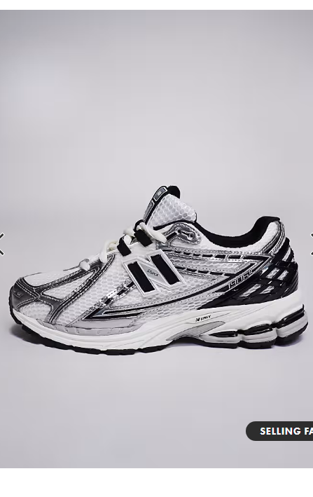 New Balance 1906 sneakers in white with black and silver details