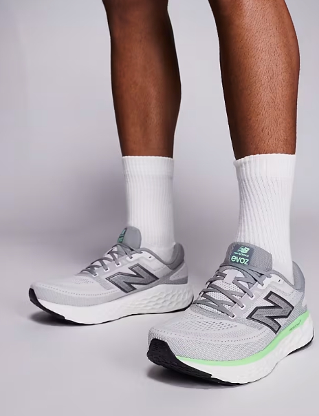 New Balance Evoz running trainers in grey and green